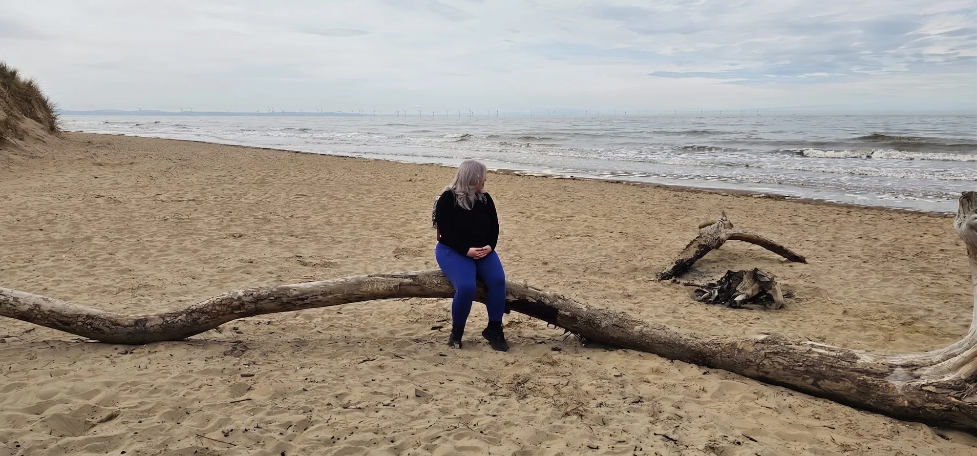 Peaceful beach scene representing calm and emotional healing