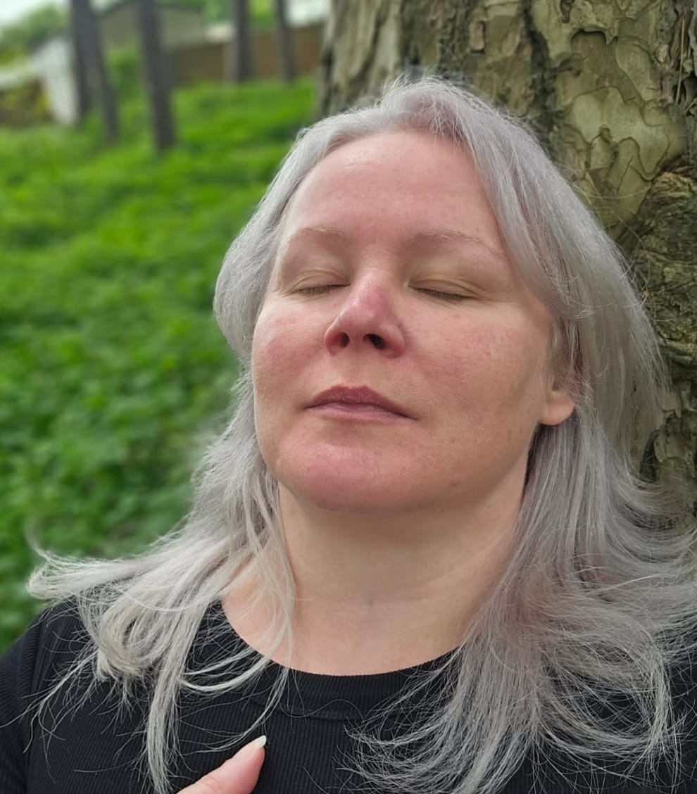 Claire in meditation, peaceful and grounded